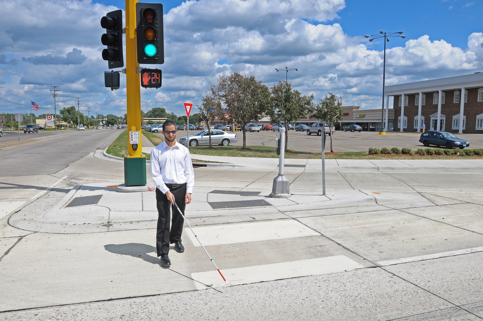 Vision-based intersection-crossing assistance for the visually impaired